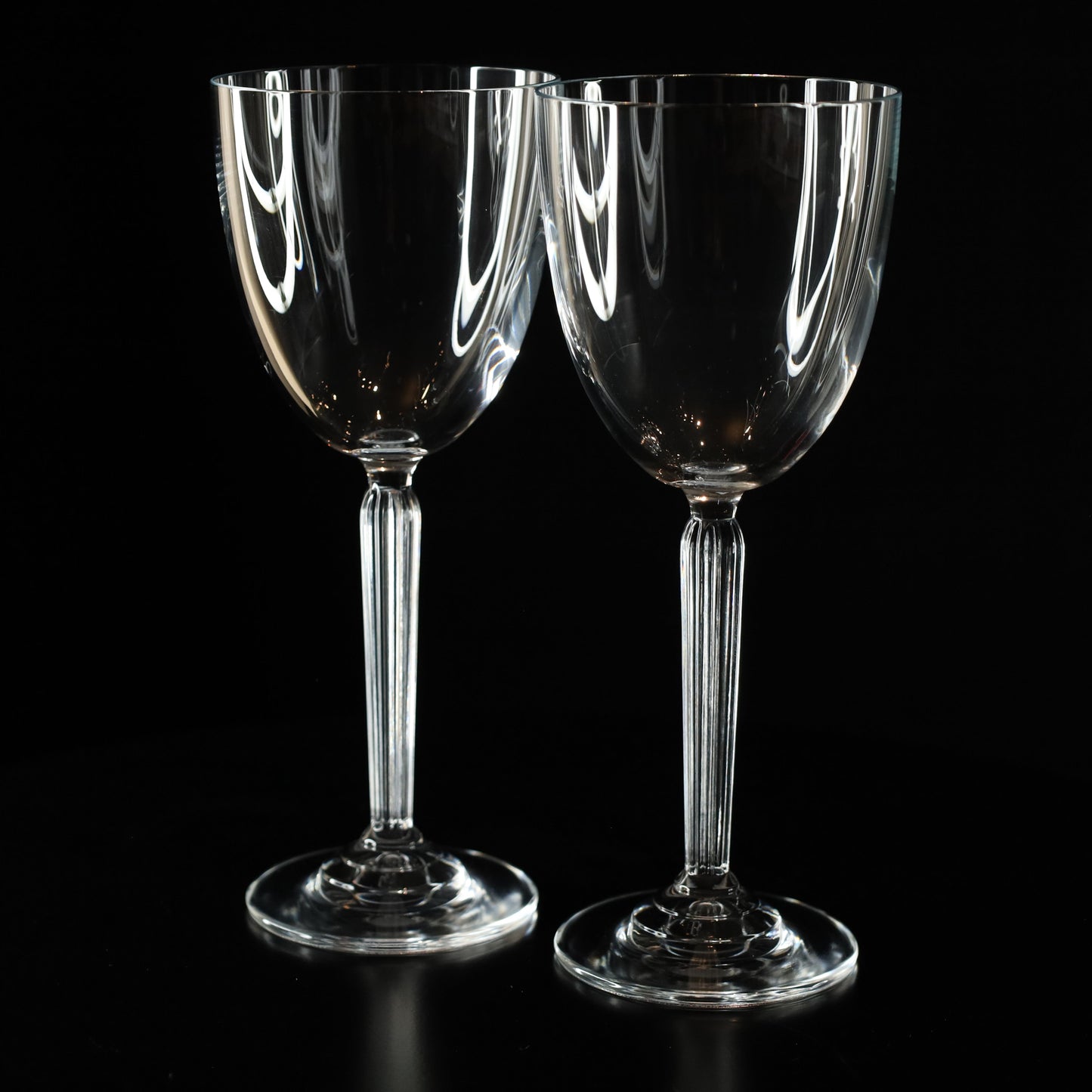 Sophisticated Aurora crystal white wine glasses featuring tall stems and a polished finish, perfect for elegant gatherings.