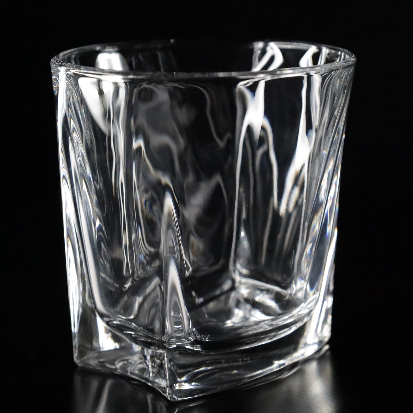 Elegant Aurora crystal tumblers crafted with a unique textured design, perfect for drinks, offered in sets of 2, 4, or 6.