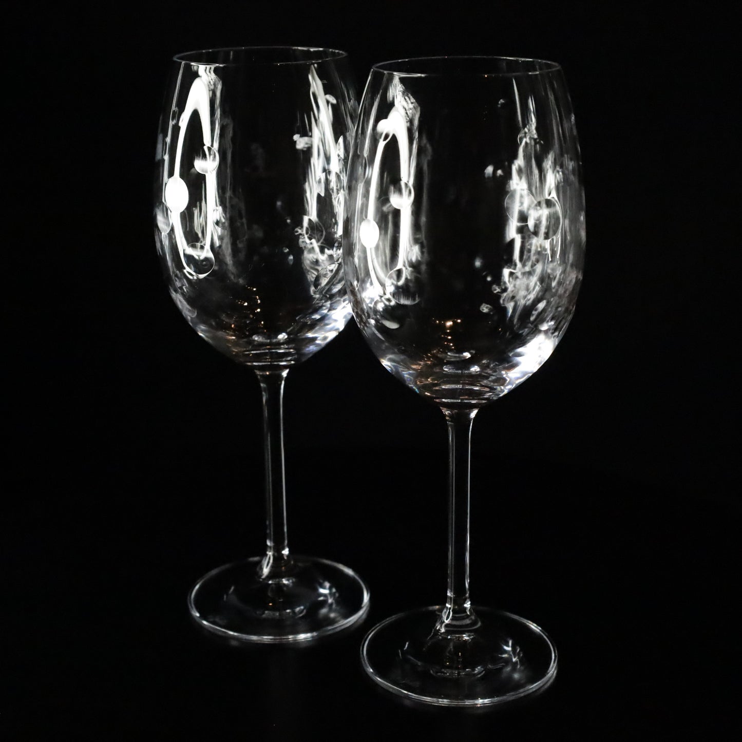 Stylish Nebula crystal red wine glass with a graceful stem and distinctive etched detailing, adding a touch of modern elegance.