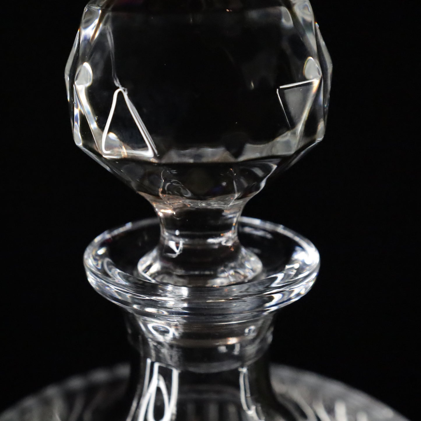 Sophisticated Serenity wine decanter with a modern ribbed design and a polished finish, perfect for serving fine wines.