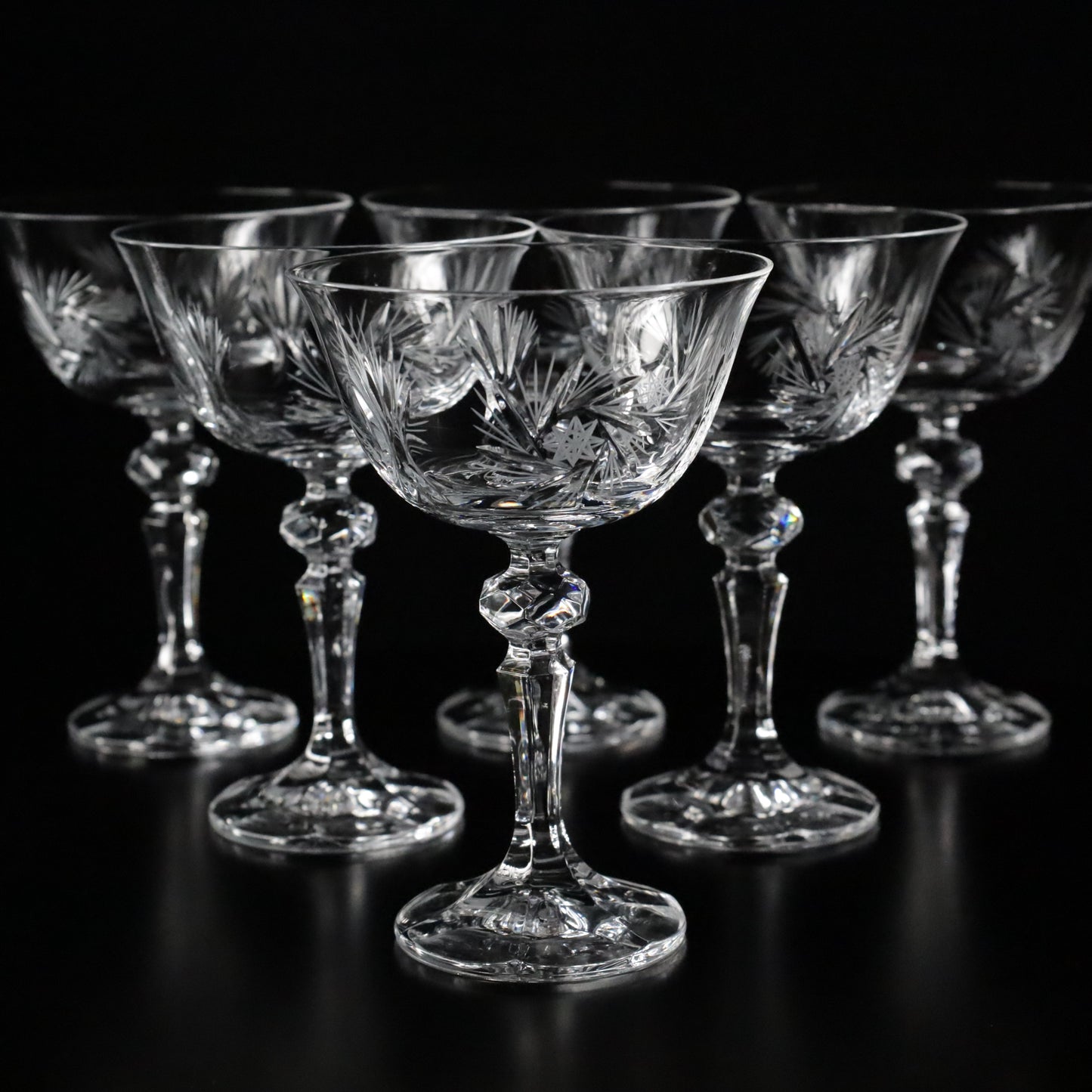 Six exquisitely crafted Antoinette champagne glasses with ornate detailing, perfect for special celebrations.