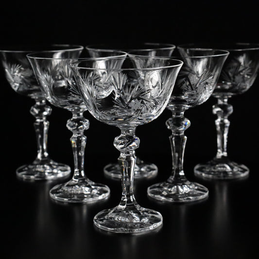 Six exquisitely crafted Antoinette champagne glasses with ornate detailing, perfect for special celebrations.