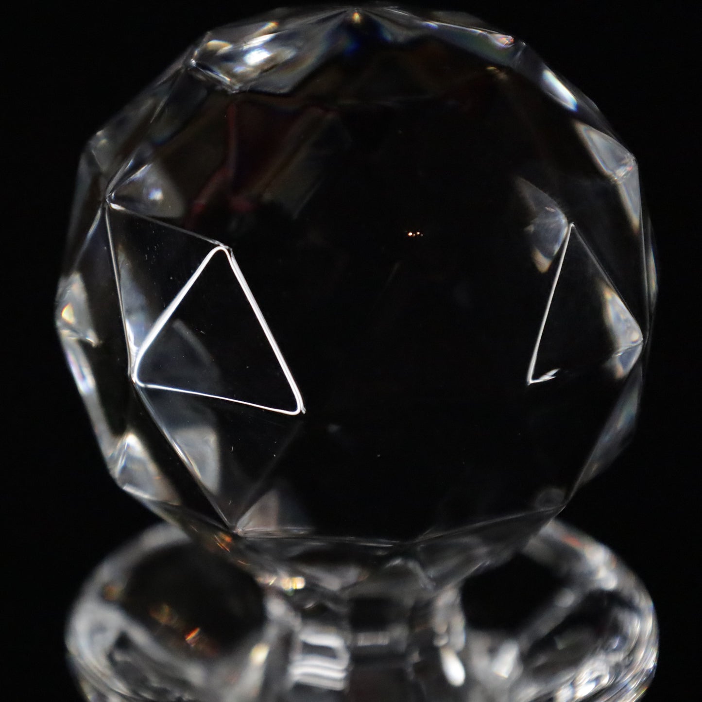 Exquisite Antoinette whisky decanter with intricate patterns and a polished crystal stopper, perfect for storing fine whisky, showcased elegantly.