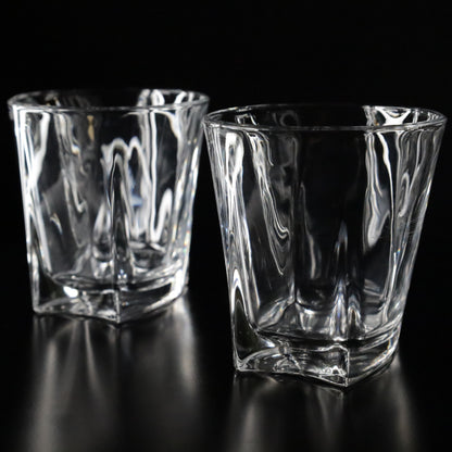 Sophisticated Aurora tumblers with a polished finish and distinctive wavy texture, available in versatile set options of 2, 4, or 6.