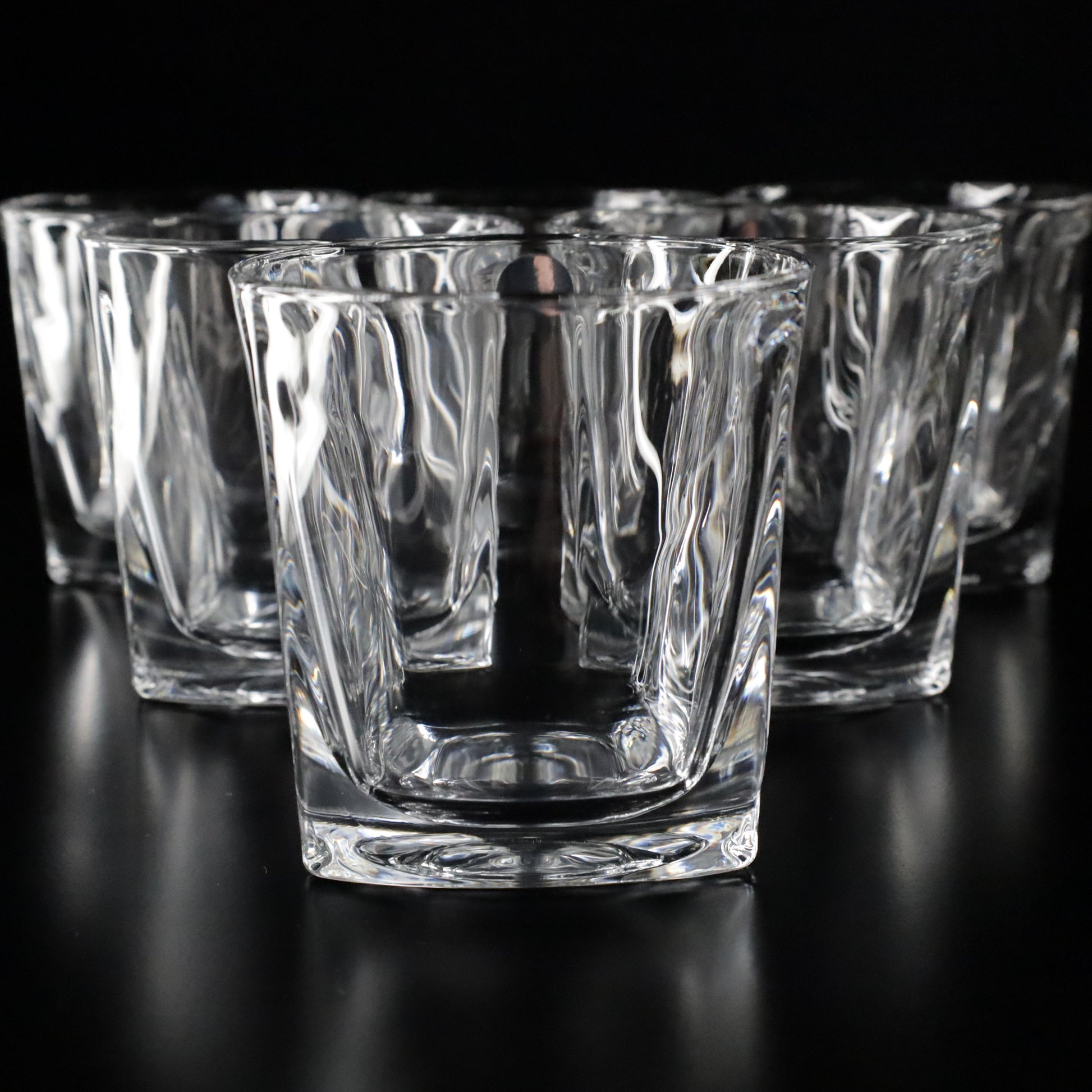 Elegant Aurora crystal tumblers crafted with a unique textured design, perfect for drinks, offered in sets of 2, 4, or 6.