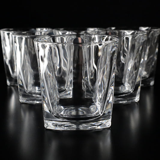Elegant Aurora crystal tumblers crafted with a unique textured design, perfect for drinks, offered in sets of 2, 4, or 6.