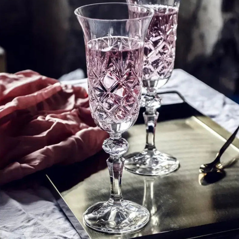 A Crown Champagne Flute crafted from premium crystal with an intricately etched bowl and sculpted stem, perfect for champagne, prosecco, or sparkling wine.