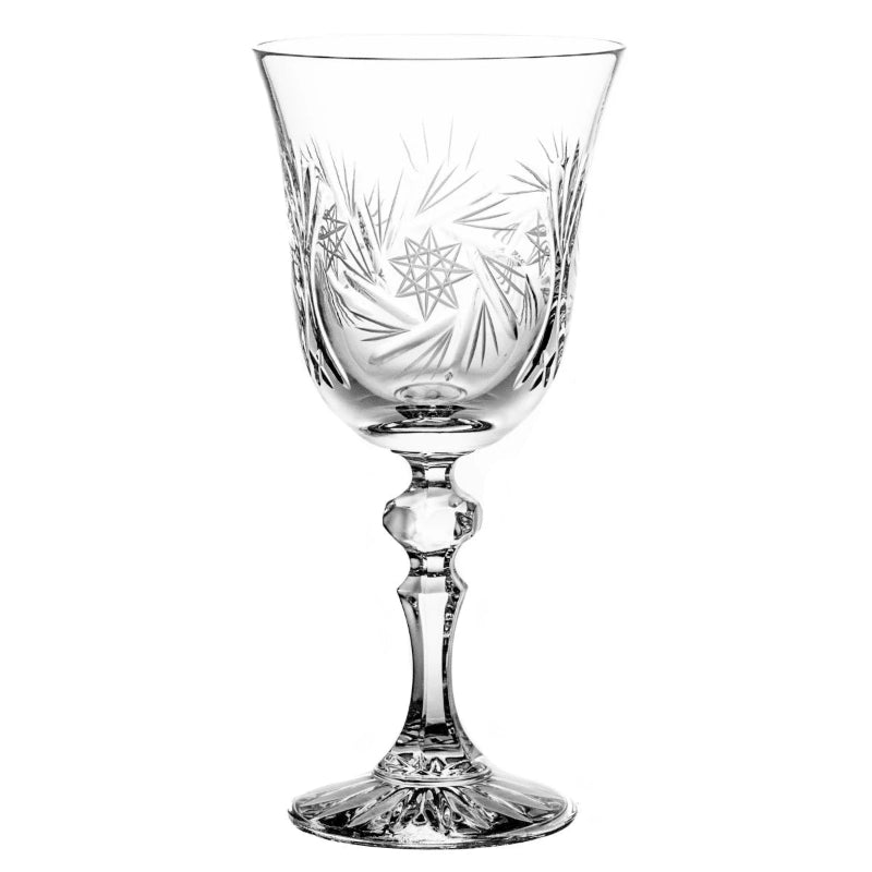 A set of crystal white wine glasses with a gracefully tapered bowl, delicate curves, and a slender stem.