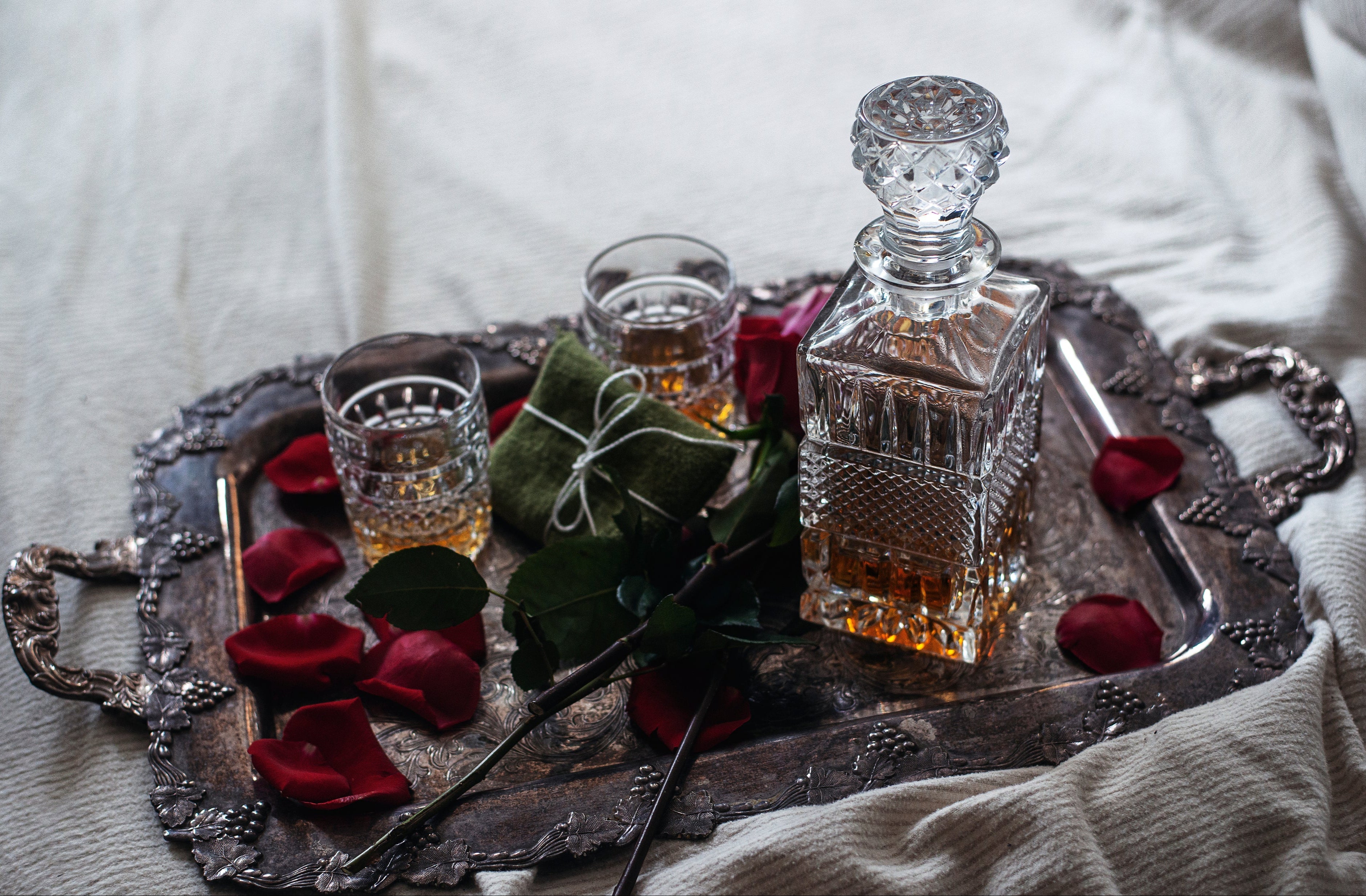 Crystal whisky glass set on a silver tray